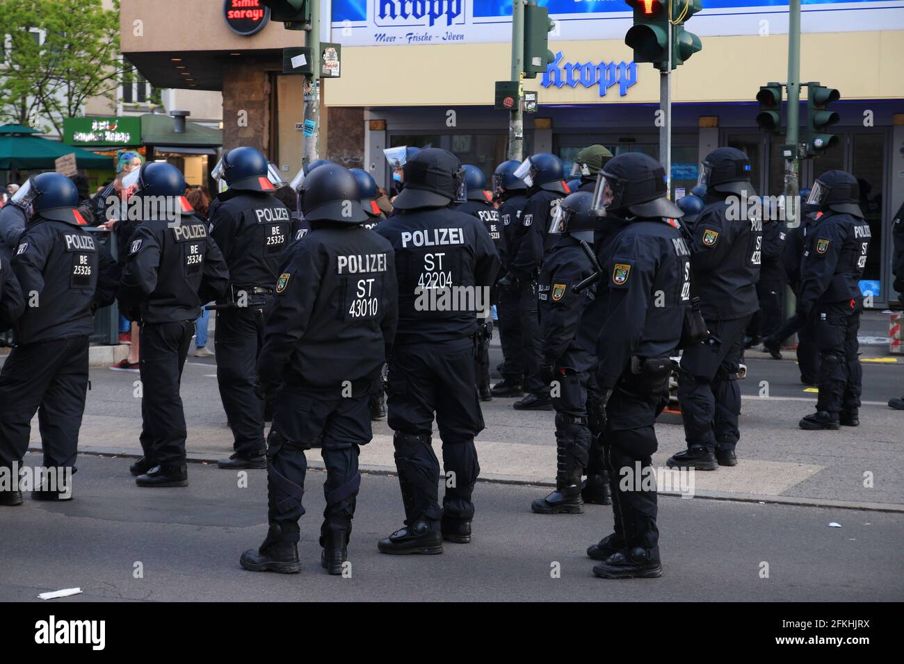 Berlin, Germany - May 01, 2021: Police team on street at myfest celebration on mayday. May Day in Berlin Neukölln refers to the street festivals and d Stock Photo