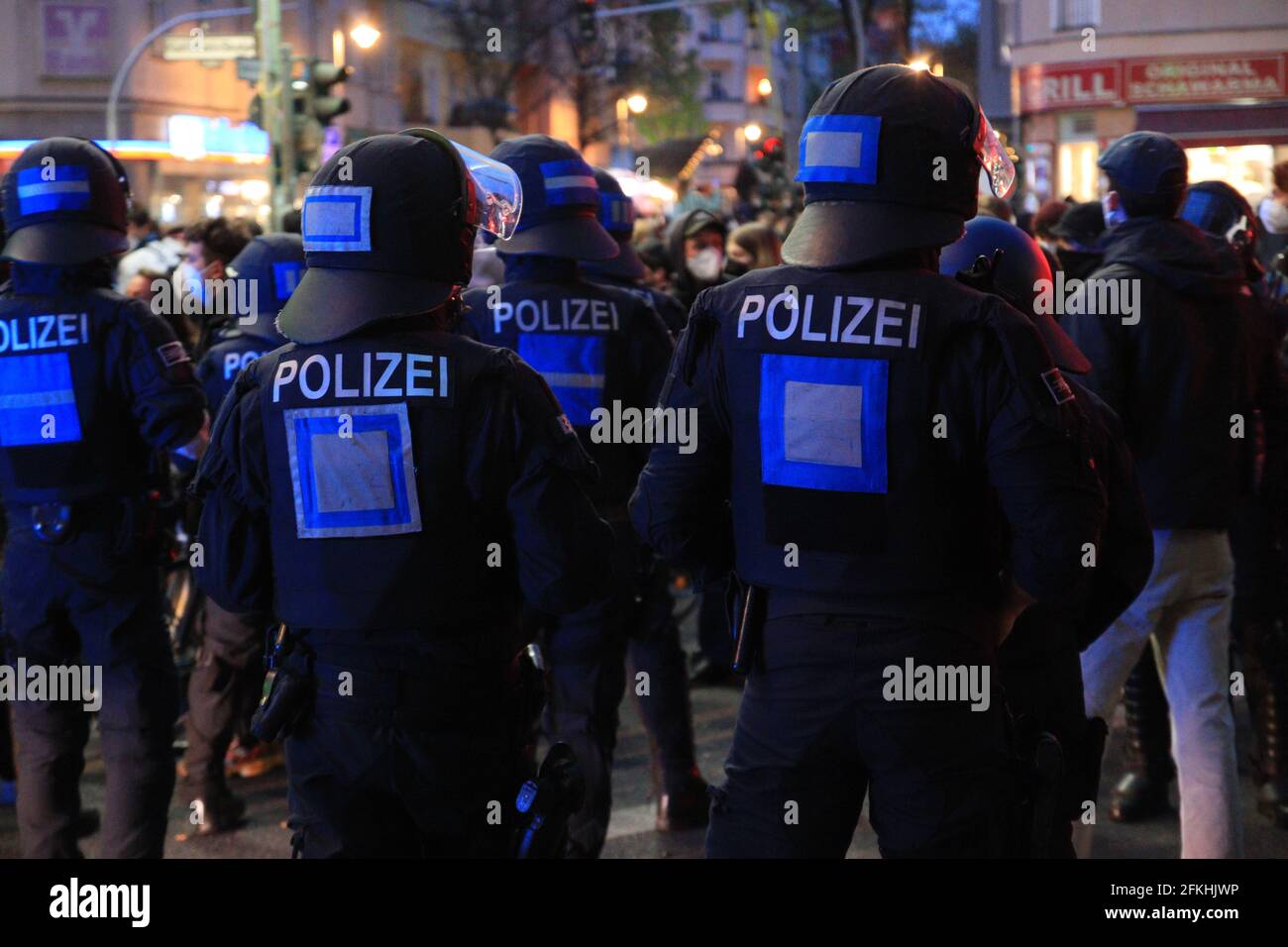 Berlin, Germany - May 01, 2021: German policeman seen from behind at myfest, Berlin. Stock Photo