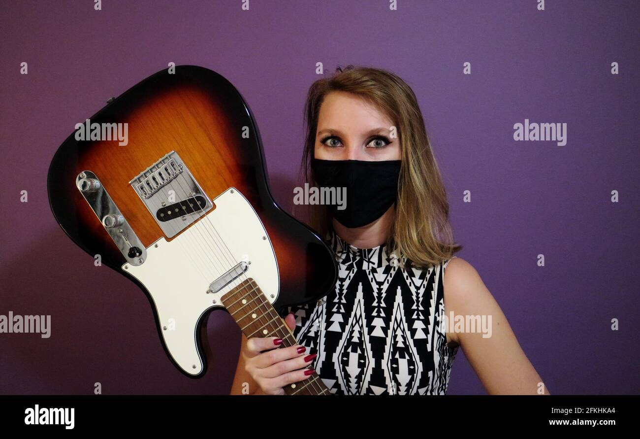 Female fender guitarist hires stock photography and images Alamy