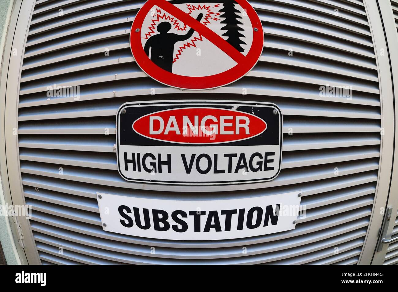 Danger high voltage substation sign shot with fish eye effect Stock Photo