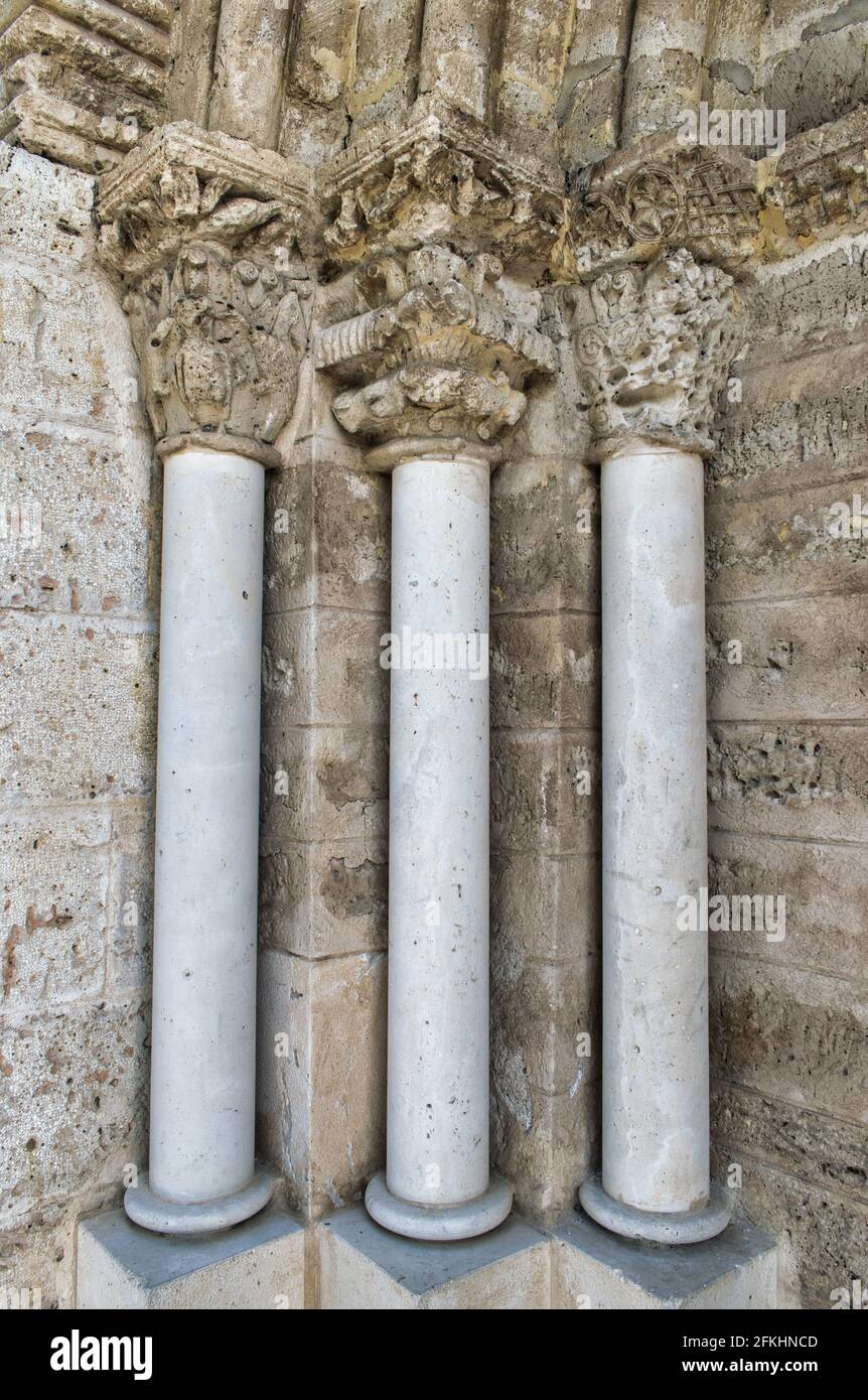 A vertical shot of columns of the 12th century church in Arroyo de la Encomienda in Valladolid Stock Photo