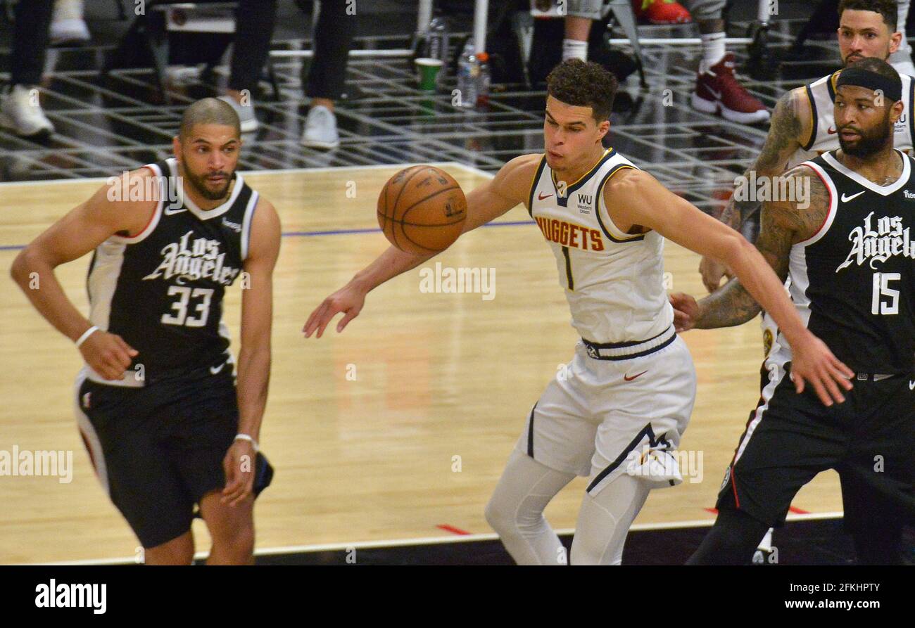 Los Angeles, United States. 02nd May, 2021. Los Angeles Clippers' forward Nicolas Batum (33) swats the ball away from Denver Nuggets' guard Michael Porter Jr. (1) during the second half at Staples Center in Los Angeles on Saturday, May 1, 2021. The Nuggets defeated the Clippers 110-104. Photo by Jim Ruymen/UPI Credit: UPI/Alamy Live News Stock Photo