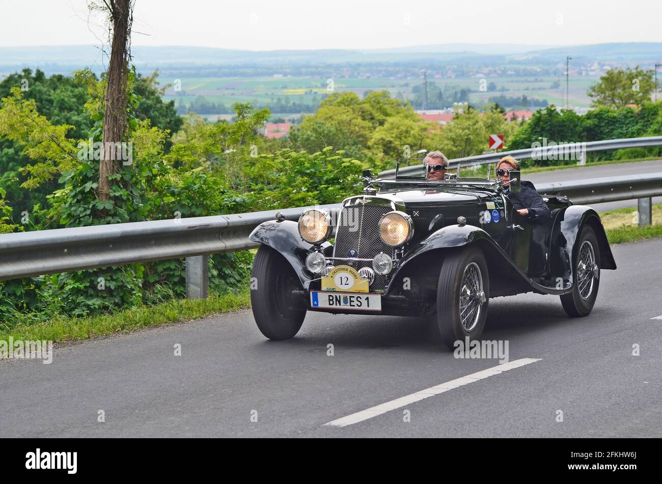 Eisenstadt, Austria - May 14th 2011: Aston Martin on 8th Oldtimer Fahrt - a yearly competition for vintage cars on special stage over Stotzinger Berg Stock Photo