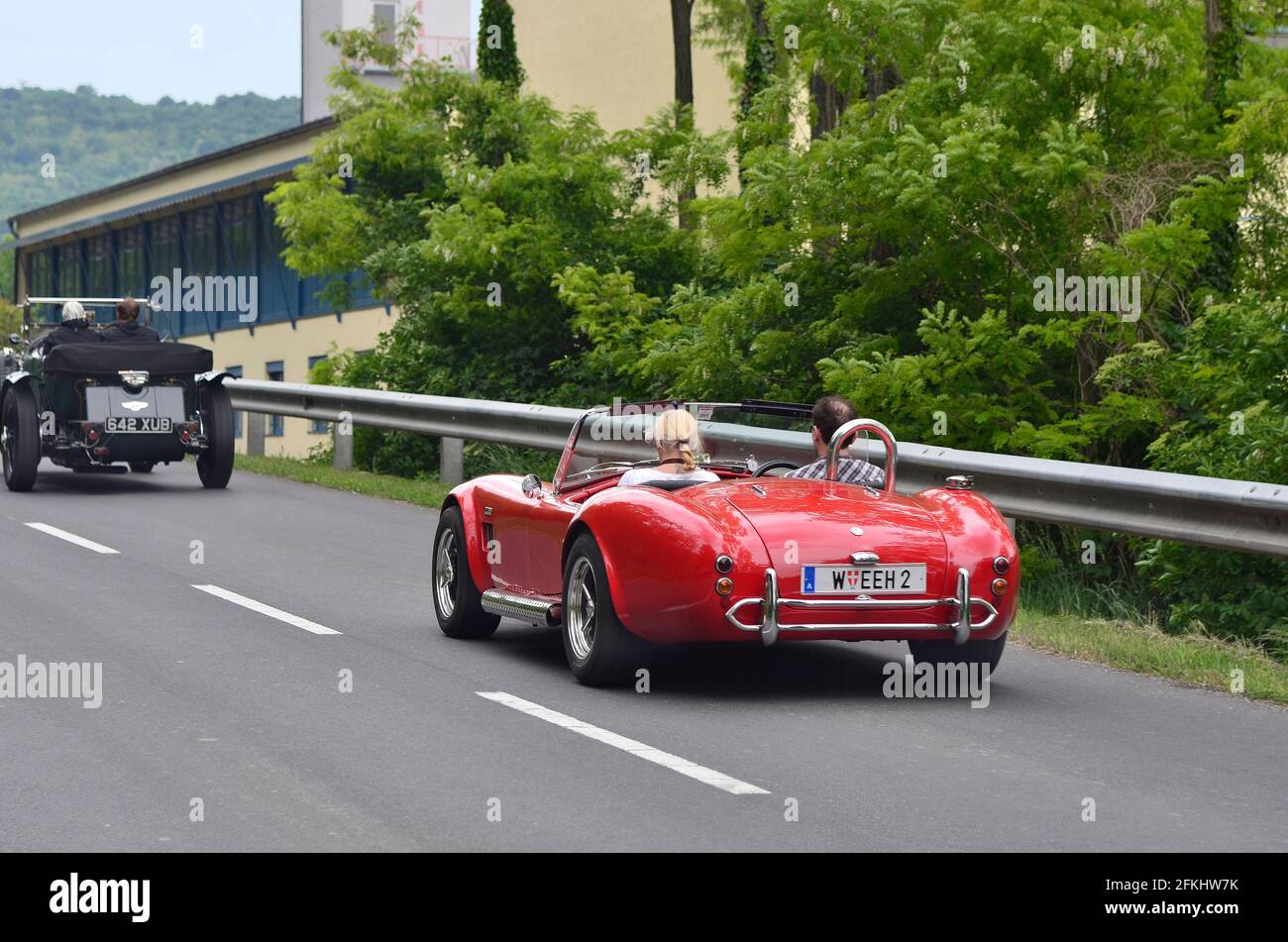 Eisenstadt, Austria - May 14th 2011: Aston Martin and Shelby 427 Cobra on 8th Oldtimer Fahrt - a yearly competition for vintage cars on special stage Stock Photo