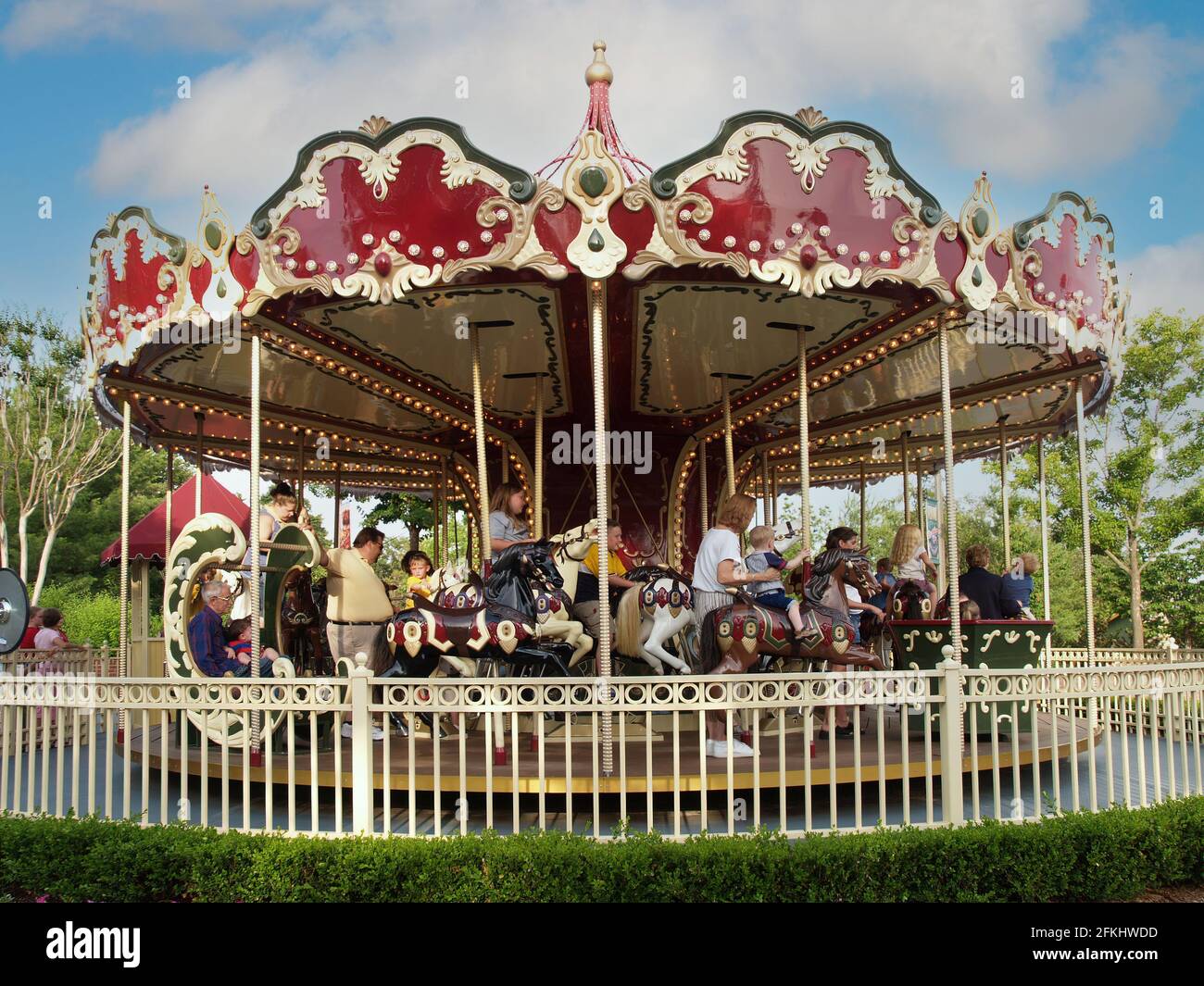A vintage carousel ride at Celebration City Theme Park in Branson, Missouri provided summer fun from days gone. Stock Photo
