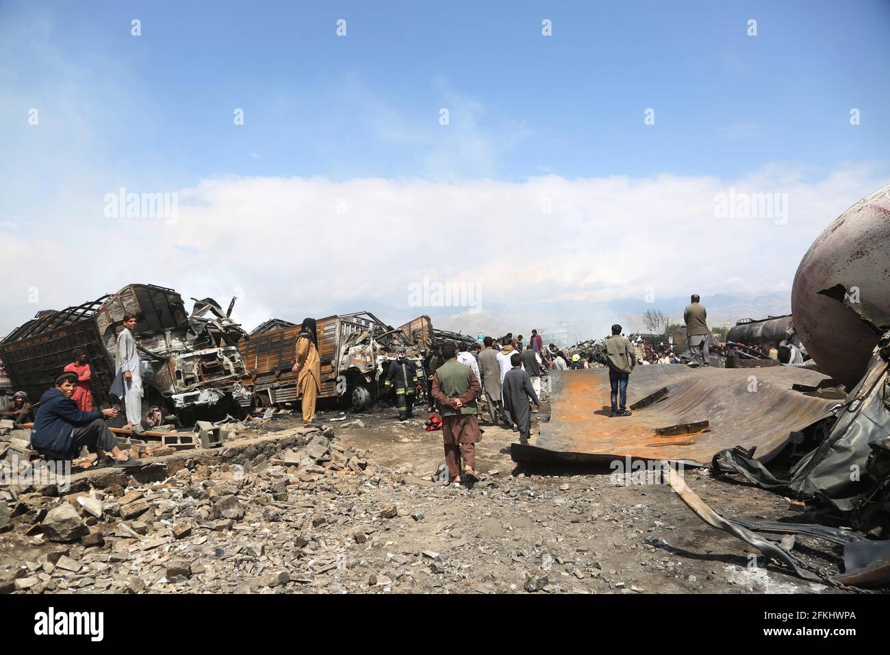 Kabul, Afghanistan. 2nd May, 2021. People gather at the site of a fuel