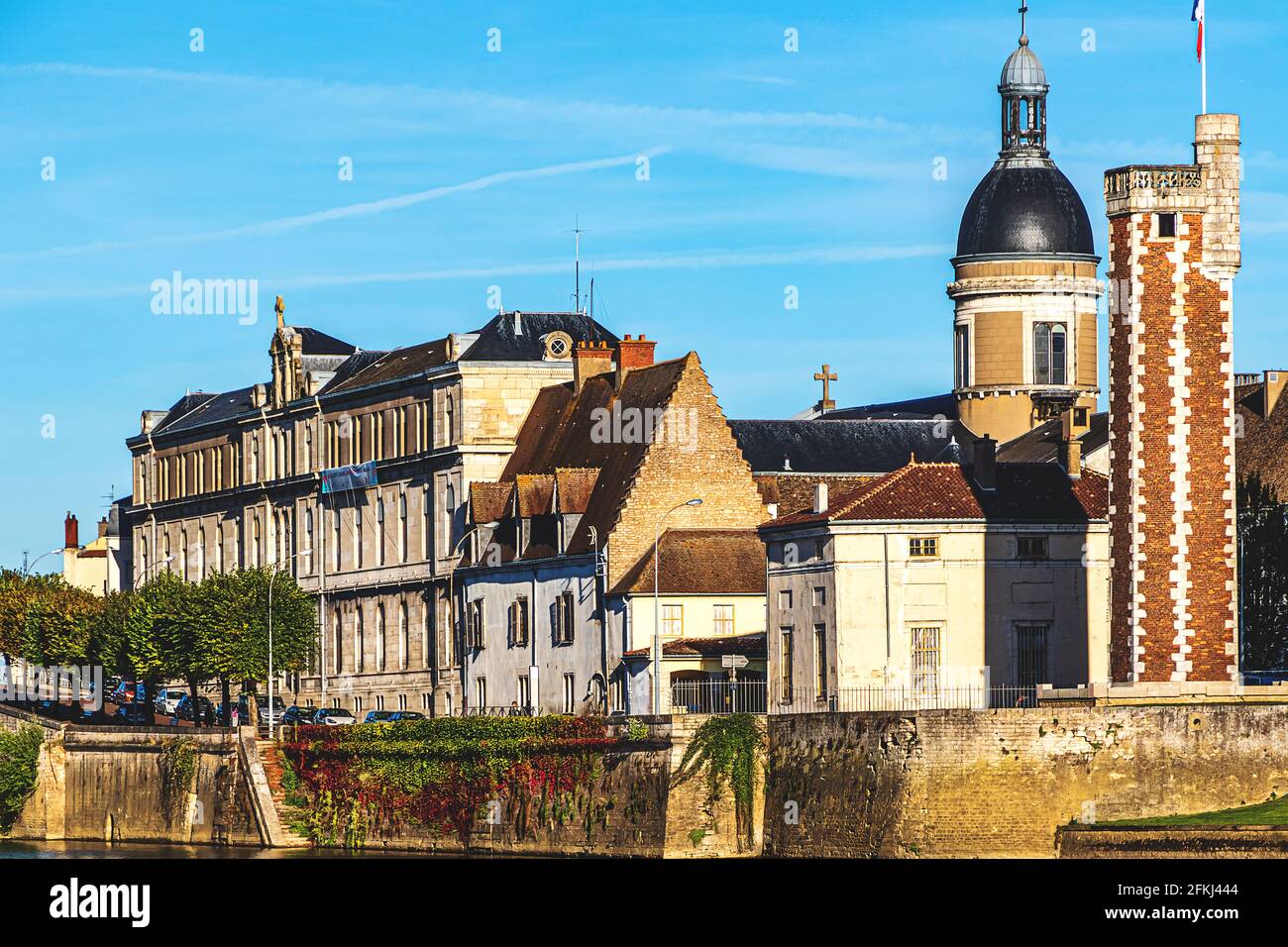 France - Quai des Messageries in Chalon sur Saone, with the Tour du Doyenne from the 15th century in the historic center on the Saint-Laurent Island. Stock Photo