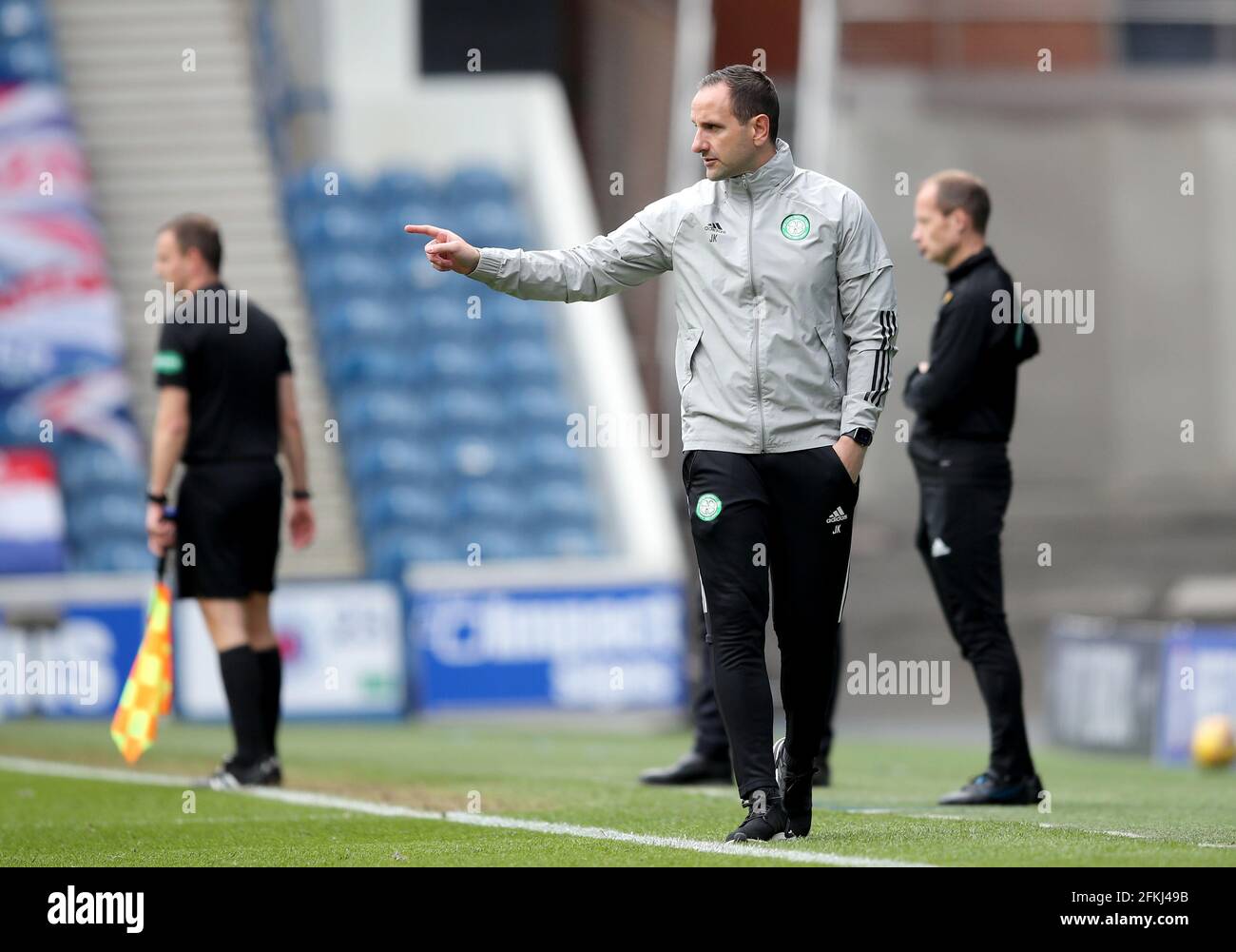 Celtic interim manager John Kennedy on the touchline during the Scottish Premiership match at Ibrox Stadium, Glasgow. Issue date: Sunday May 2, 2021. Stock Photo