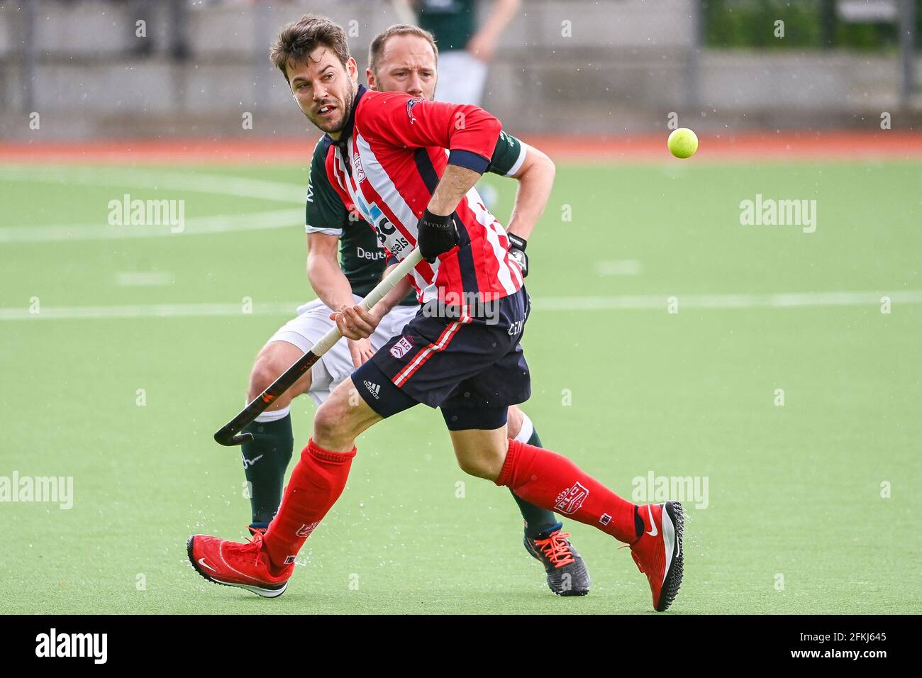 Leopold's Gaspard Baumgarten and Watduck's Renaud Pangrazio fight for the ball during a hockey game between Waterloo Ducks HC and Royal Leopold Club, Stock Photo