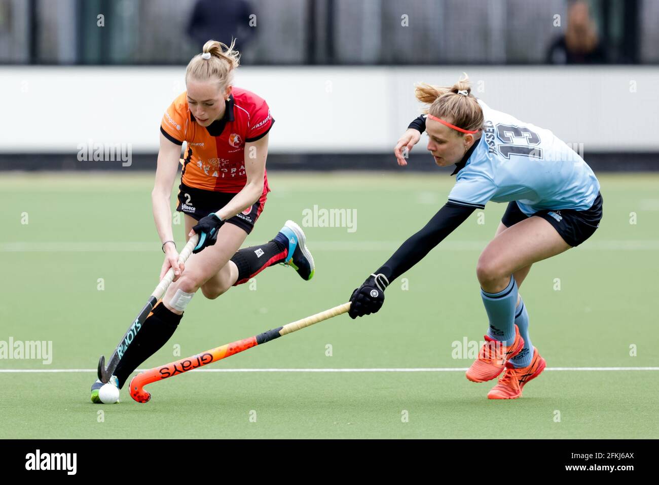 EINDHOVEN, NEDERLAND - MAY 2: Fiona Morgenstern of Oranje Rood and Zoe Hessels of HGC during the Hoofdklasse Dames match between Oranje-Rood and HGC at Genneper Parken on May 2, 2021 in Eindhoven, Nederland (Photo by Perry van de Leuvert/Orange Pictures) Stock Photo