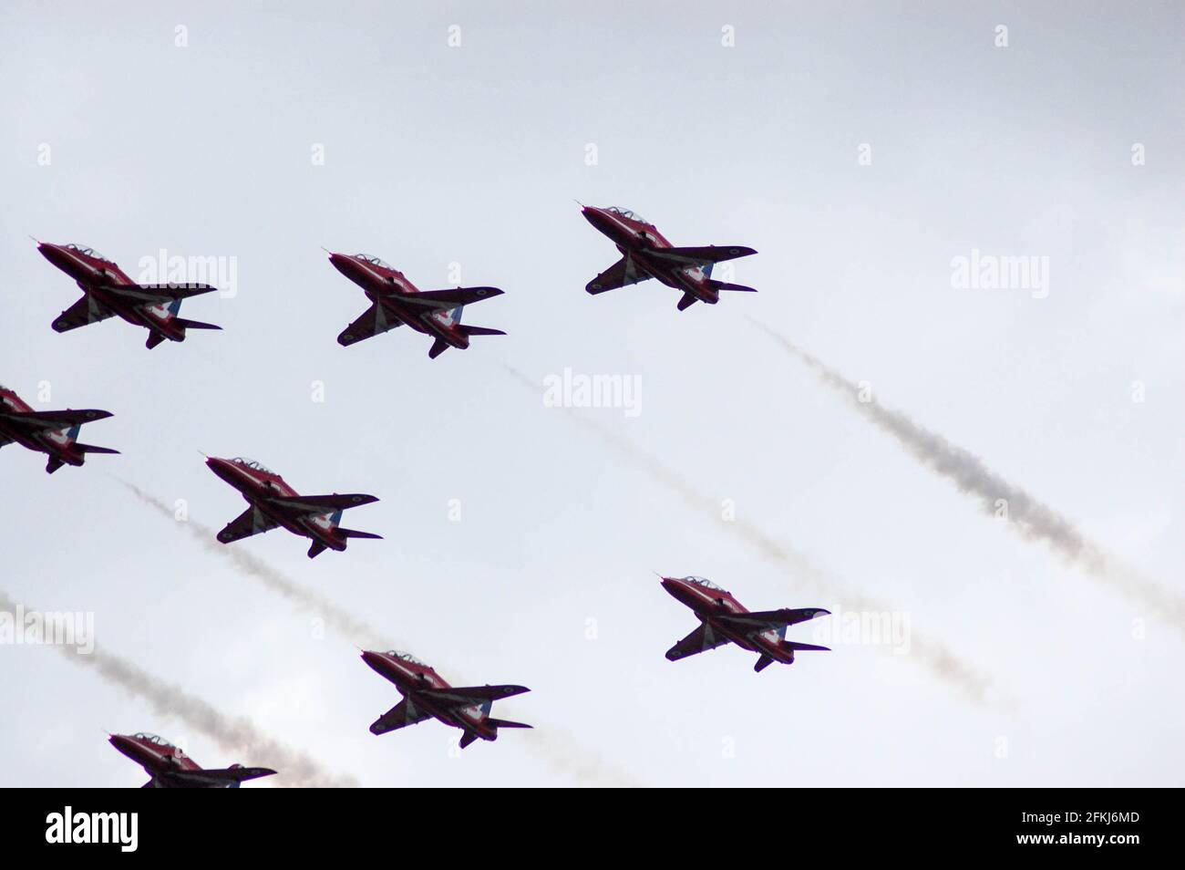 Red arrows display team flying at air show Jersey Stock Photo Alamy