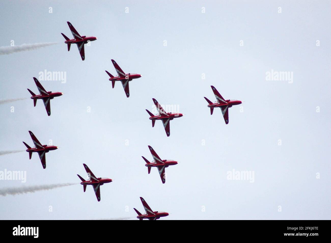 Red arrows display team flying at air show Jersey Stock Photo Alamy