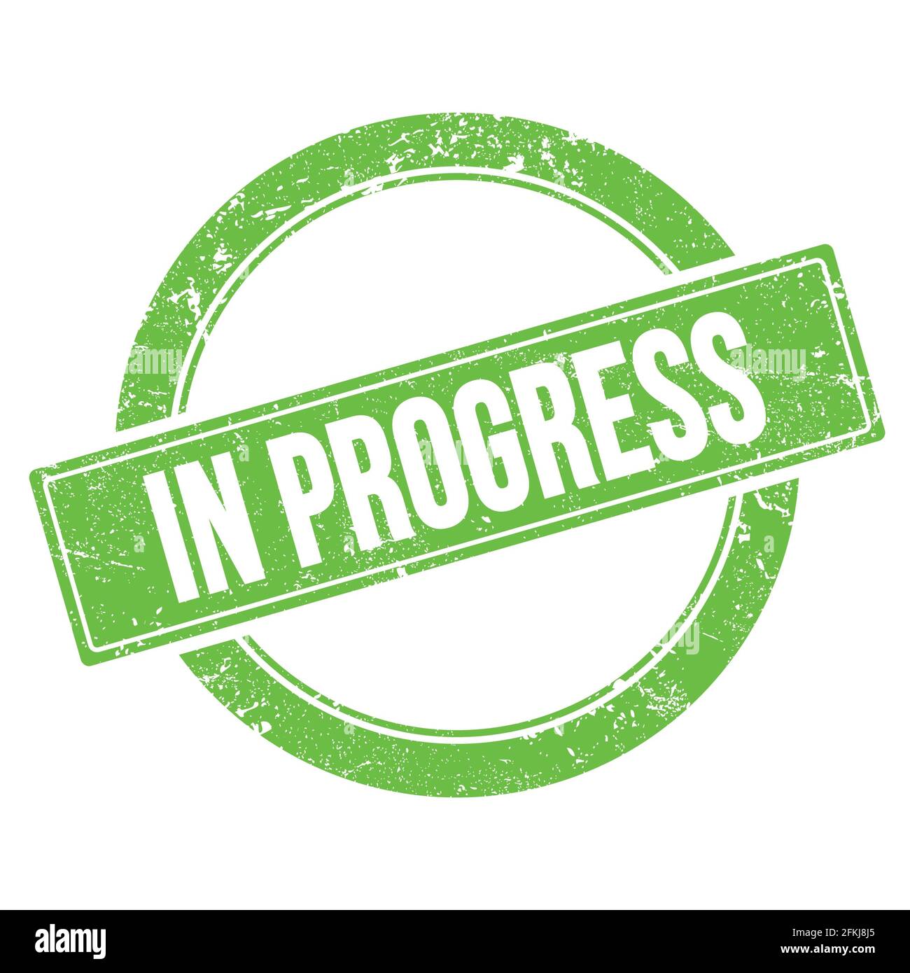 IN PROGRESS text on green grungy round vintage stamp Stock Photo - Alamy