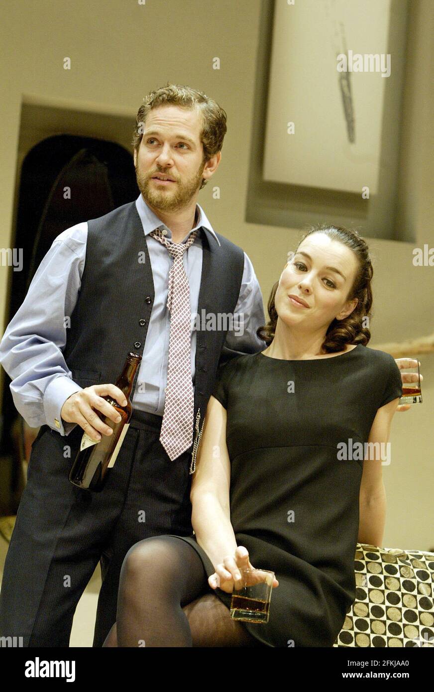 Tom Hollander (Laurie), Olivia Williams (Annie) in THE HOTEL IN AMSTERDAM by John Osborne at the Donmar Warehouse, London WC2  17/09/2003  design: Liz Ashcroft  lighting: Mick Hughes  director: Robin Lefevre Stock Photo