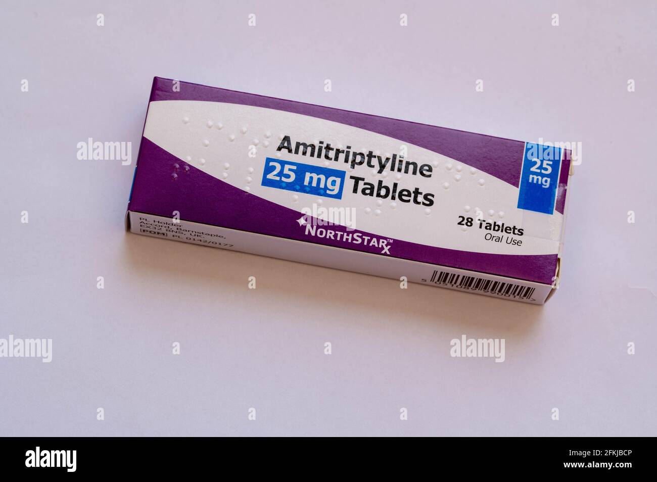 An image of a box of Amitriptyline 25 micro grams tablets for the treatment of Tricyclic anti depressant and pain relief Stock Photo