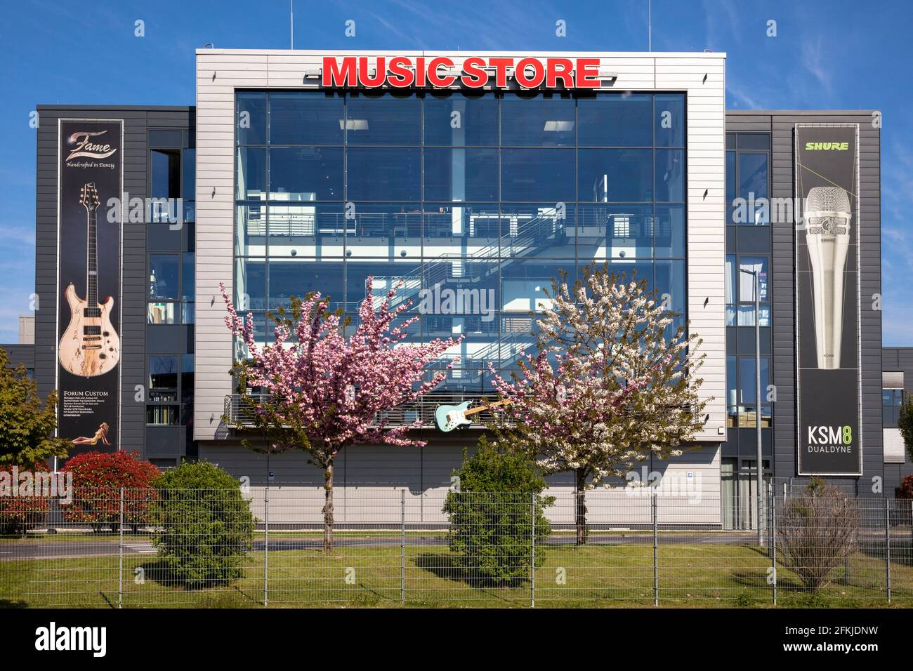 Music Store, headquarters, specialist shop for musical instruments, musician's accessories, stage-, recording studio- and DJ- equipment in the Kalk di Stock Photo