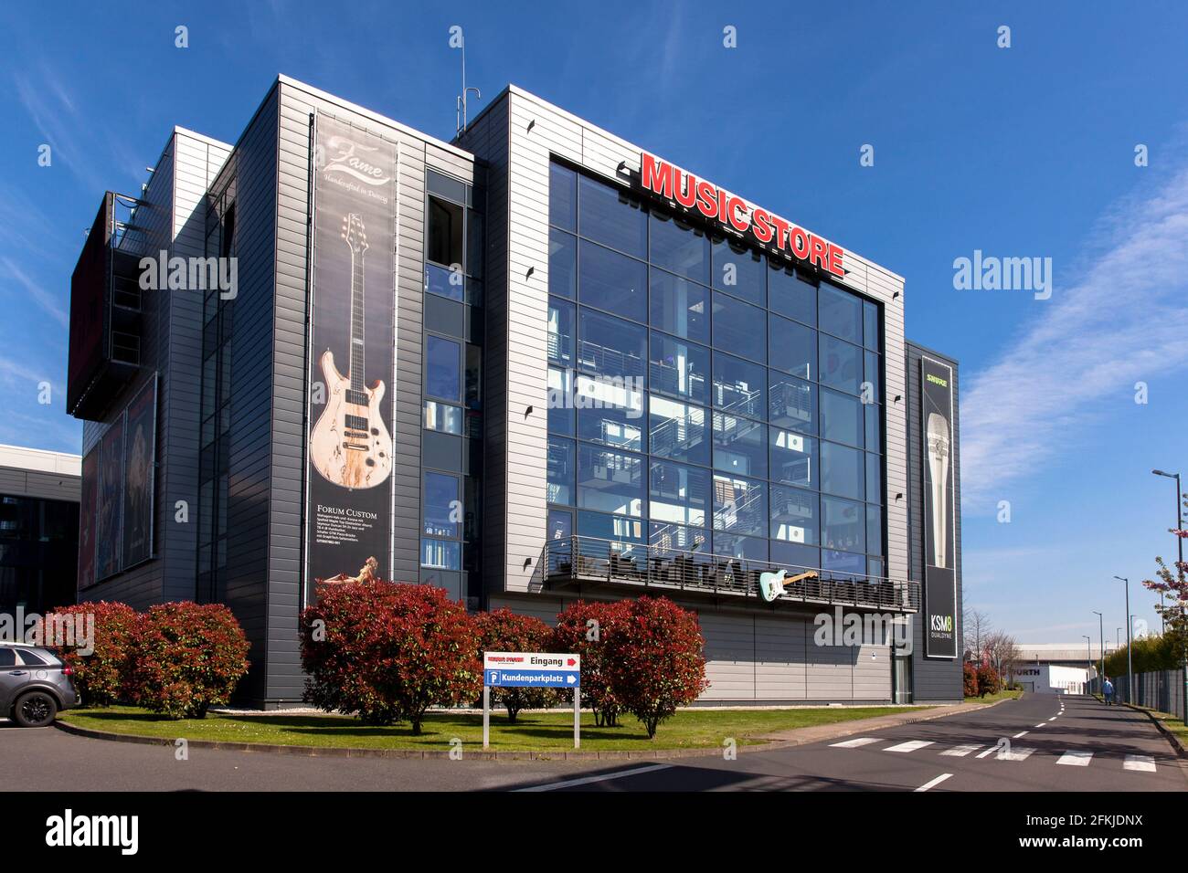 Music Store, headquarters, specialist shop for musical instruments, musician's accessories, stage-, recording studio- and DJ- equipment in the Kalk di Stock Photo