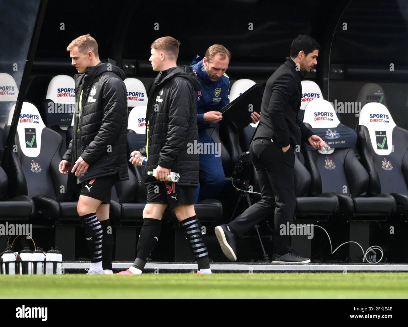 Arsenal manager Mikel Arteta (right) leaves the wrong dugout during the Premier League match at St James' Park, Newcastle upon Tyne. Issue date: Sunday May 2, 2021. Stock Photo