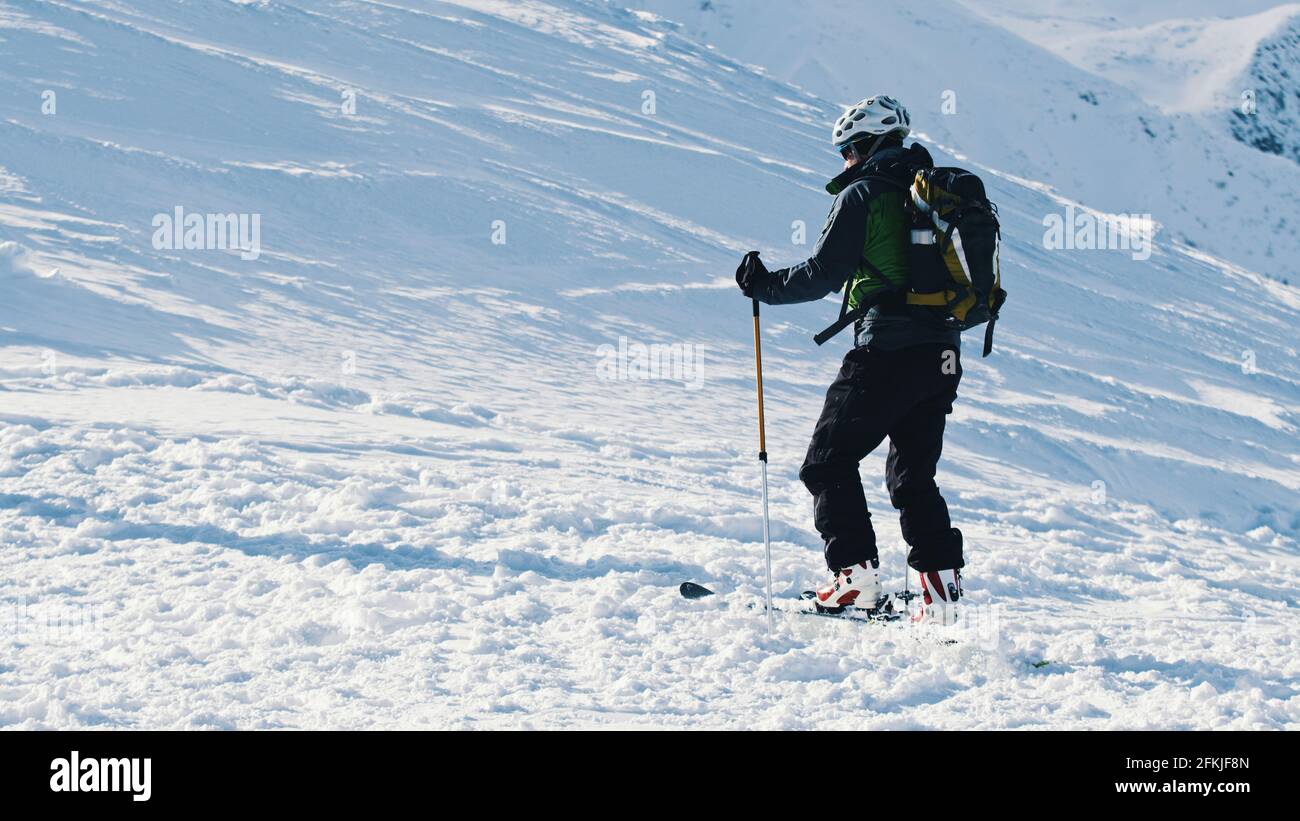 Kasprowy Wierch, Poland 28.01.2021 - Skier holding Ski Poles On A Snowy Landscape . High quality photo Stock Photo