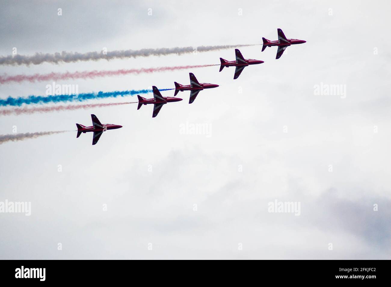 Red arrows display team flying at air show Jersey Stock Photo Alamy