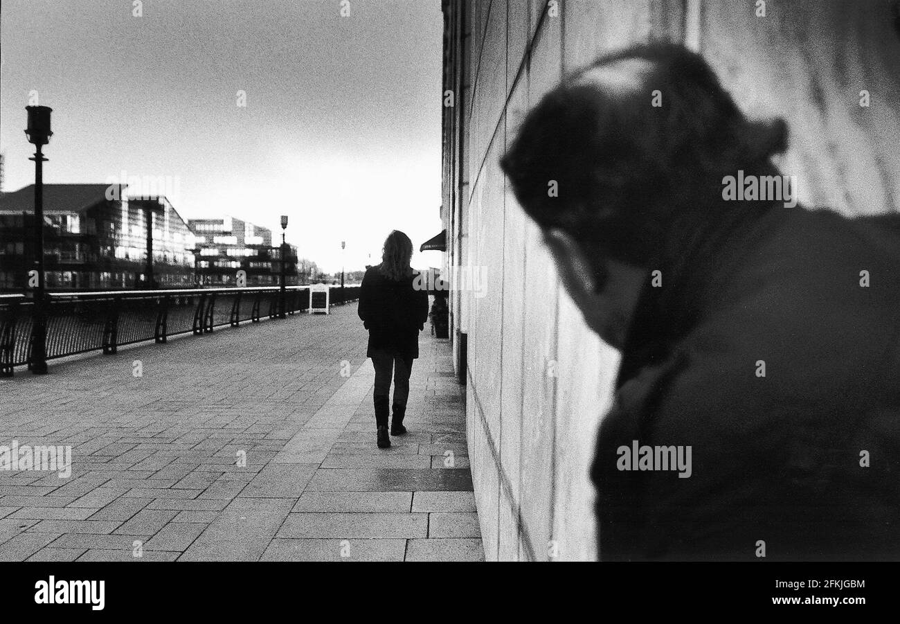 Man and stalking woman Black and White Stock Photos & Images Alamy