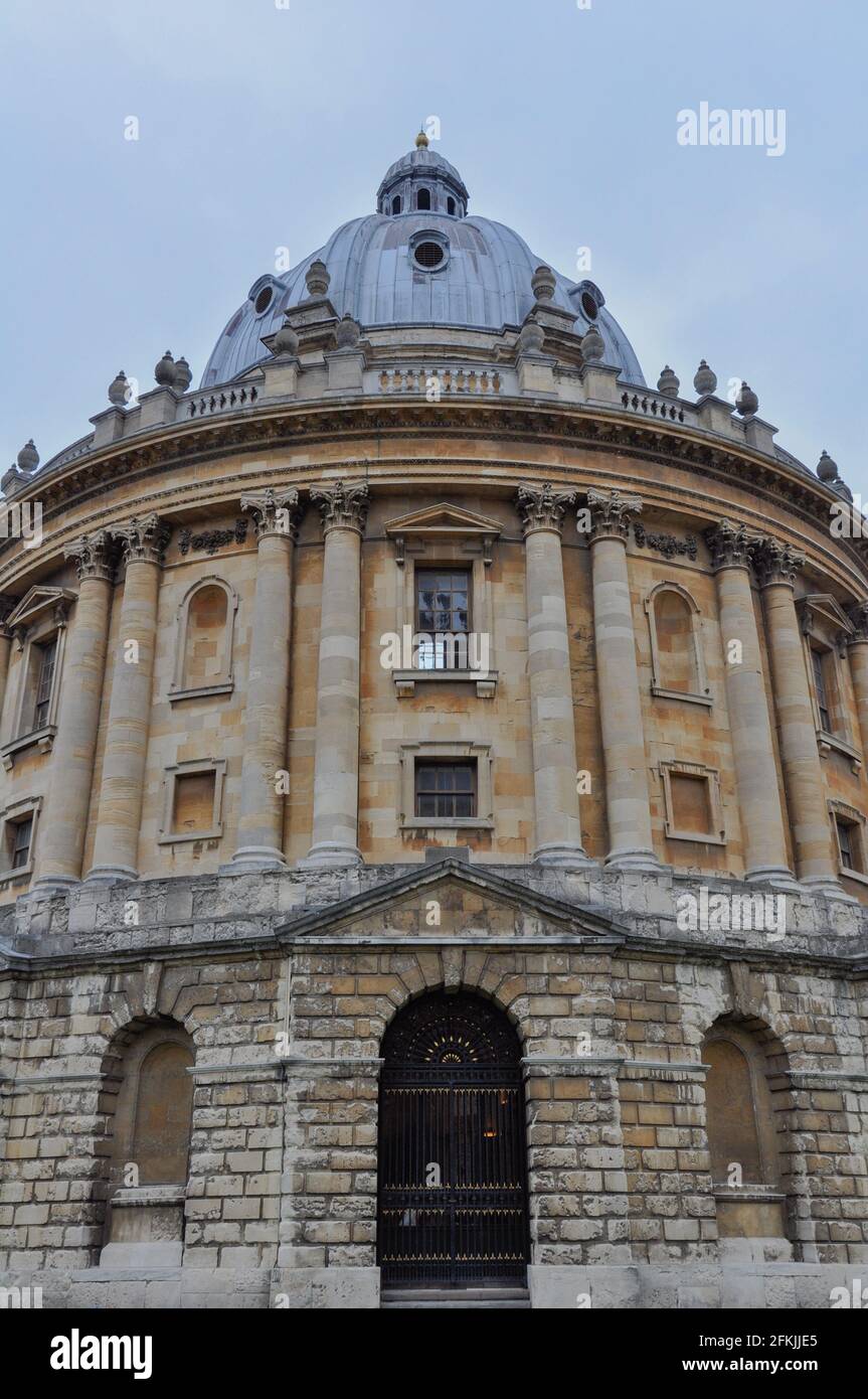 View of Radcliffe Camera facade & sky with intricate architectural detailing in English Palladian style, Oxford, United Kingdom. Stock Photo