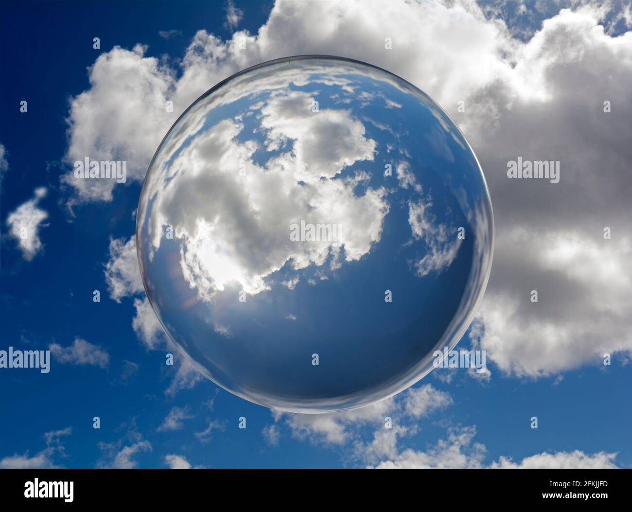 A blue sky seen through a crystal ball Stock Photo - Alamy
