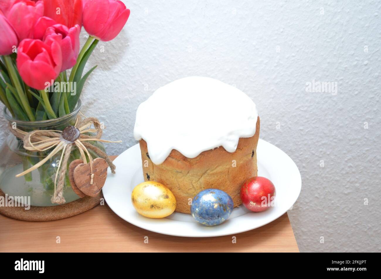 tulip bouquet holiday easter a vase with tulips and Easter eggs Stock