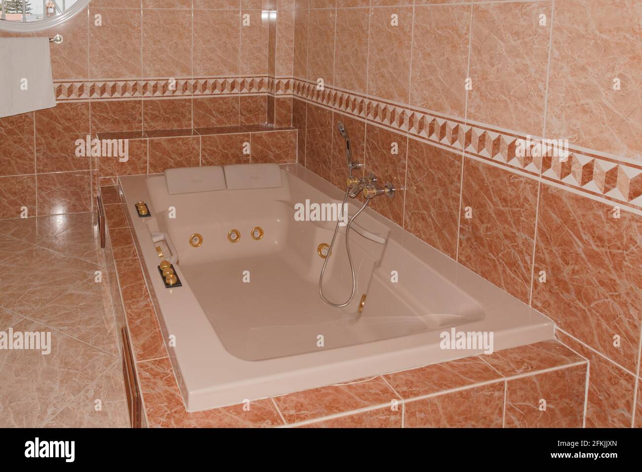 Beautiful bathroom with whirlpool bathtub and separate shower Stock