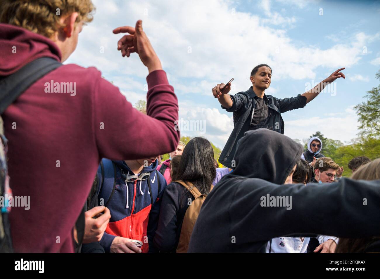 Belgium, Germany, May 1, 2021. People dance during Boum 2 event in Brussels, Belgium on May 1, 2021. The Collectif Abime called for a second edition of La Boum, an illegal gathering to protest against the Covid19 mesures and happening in Le Bois de la Cambre in Brussels. Photo by Julie Sebadelha/ABACAPRESS.COM Stock Photo