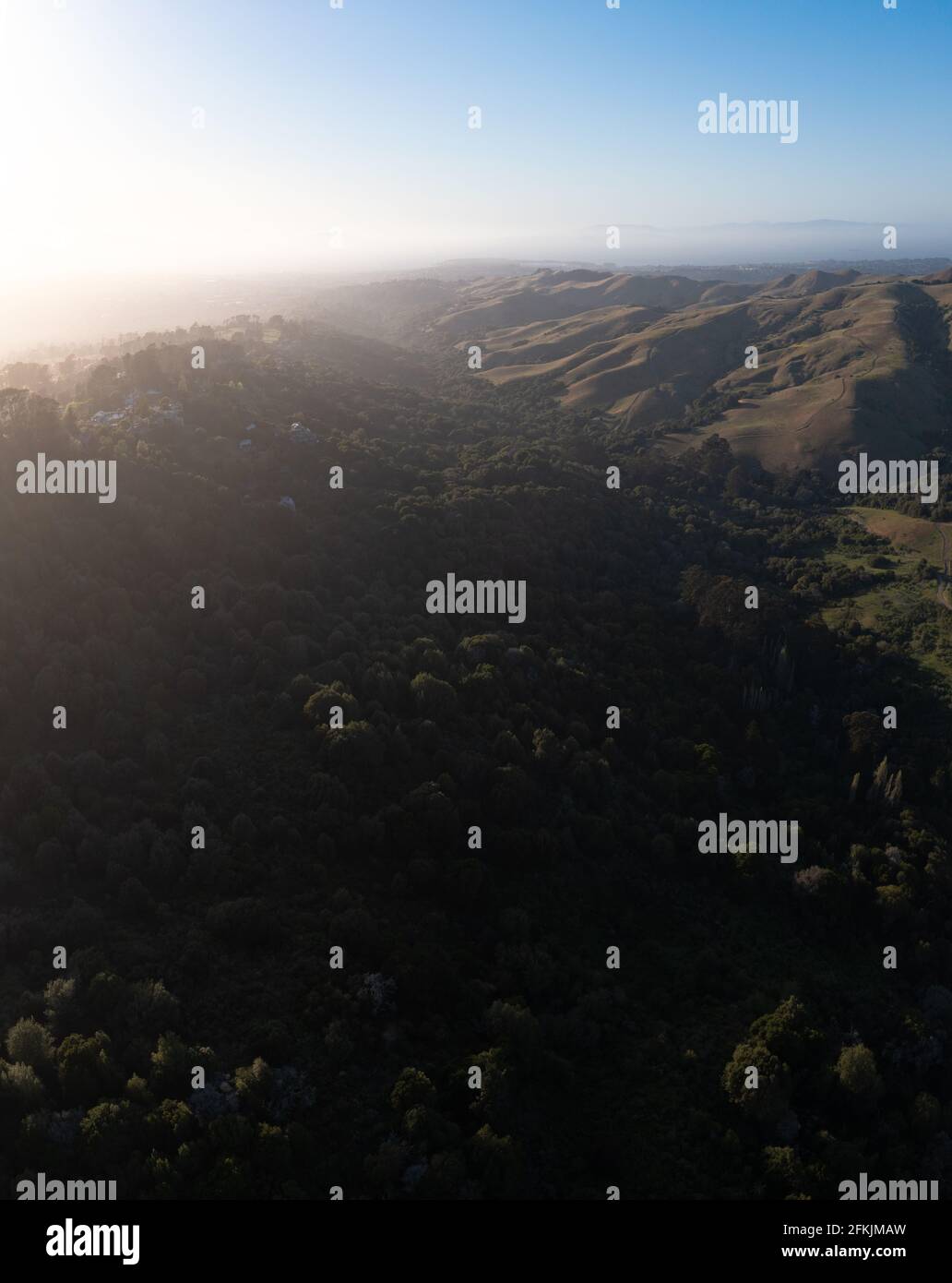 Evening sunlight shine on the serene, rolling hills of the East Bay, just east of San Francisco Bay, California. This area abuts Oakland and Berkeley. Stock Photo