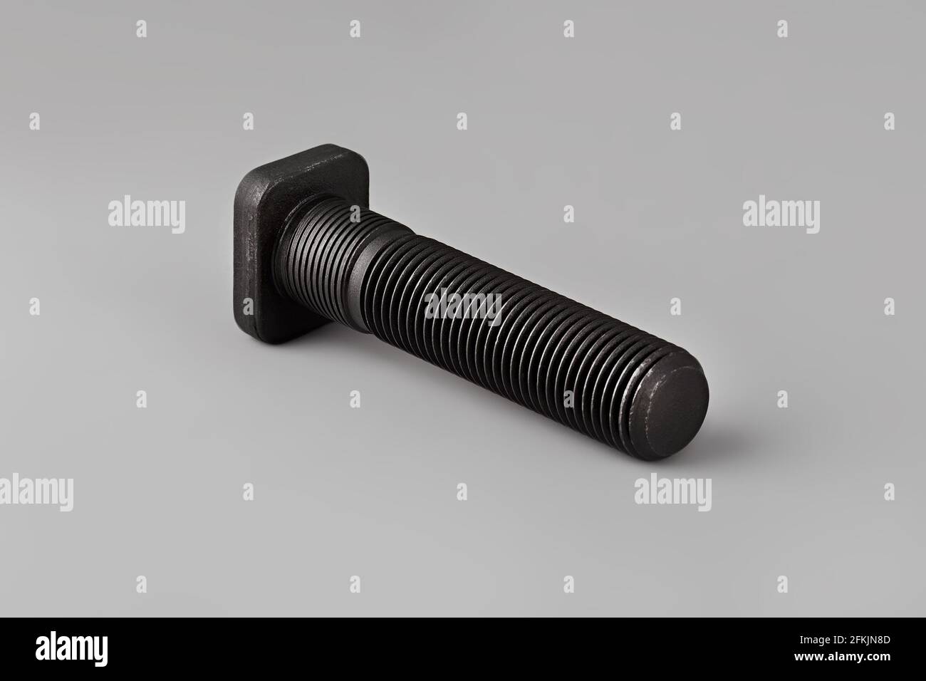 Wheel mounting bolt on a gray background. Battery terminal mounting bolt. Bolt. Car Bolt Stock Photo