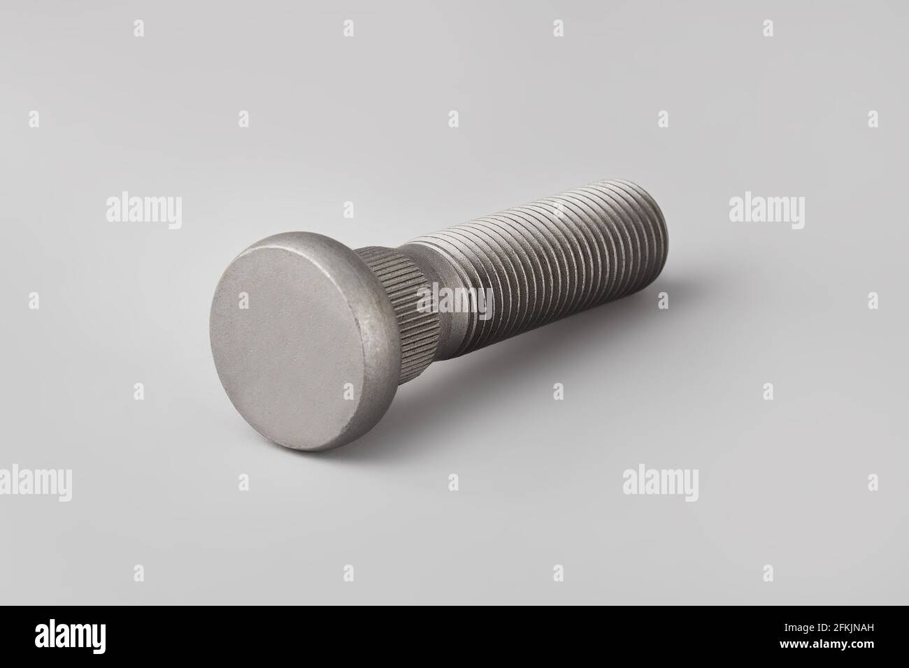 Wheel mounting bolt on a gray background. Battery terminal mounting bolt. Bolt. Car Bolt Stock Photo