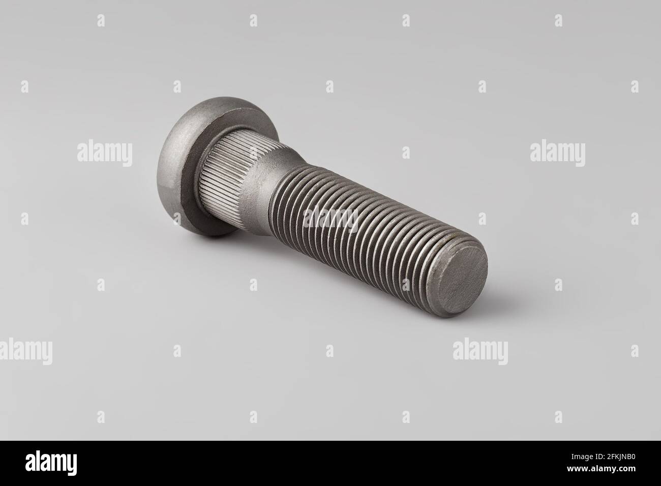 Wheel mounting bolt on a gray background. Battery terminal mounting