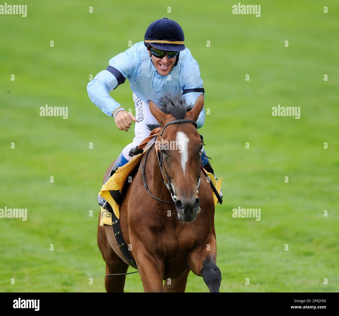 OLIVIER PESLIER ON HARBINGER WINS THE KING GEORGE V1 & QUEEN ELIZABETH STAKES. 23/7/10. PICTURE DAVID ASHDOWN Stock Photo