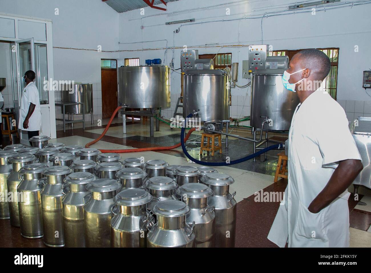 (210502) -- NYANZA, May 2, 2021 (Xinhua) -- Photo taken on April 30, 2021 shows milk processing equipment at Zirakamwa Meza Dairy in Nyanza district, about a two-hour drive from the Rwandan capital city Kigali. TO GO WITH 'Feature: From genocide widow to successful businesswoman -- Rwandan woman walking out of shadow' (photo by Cyril Ndegeya/Xinhua) Stock Photo