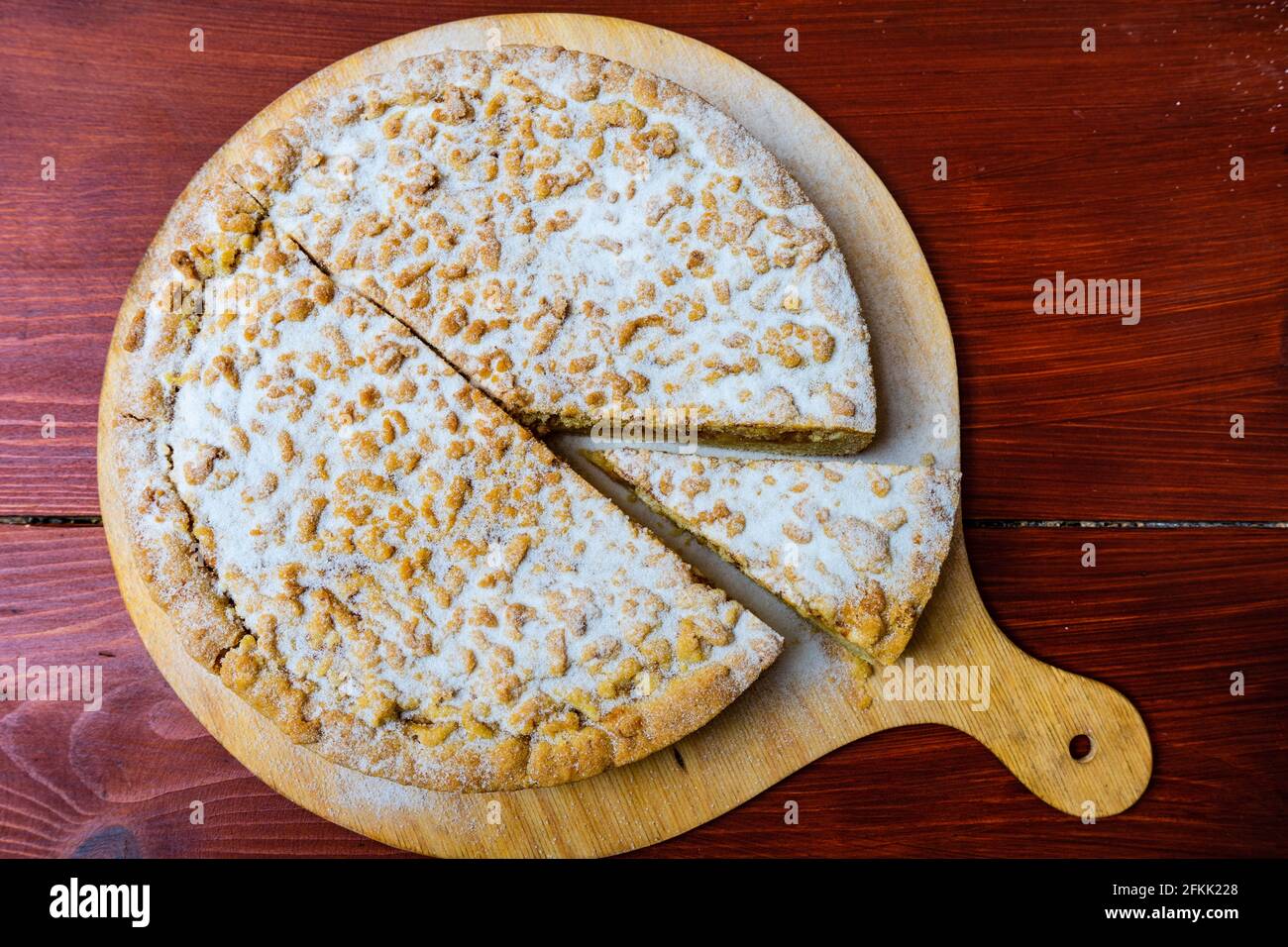 Fresh baked apple pie on wooden table Stock Photo