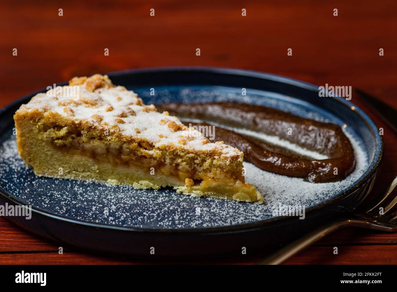 Fresh baked apple pie on wooden table Stock Photo
