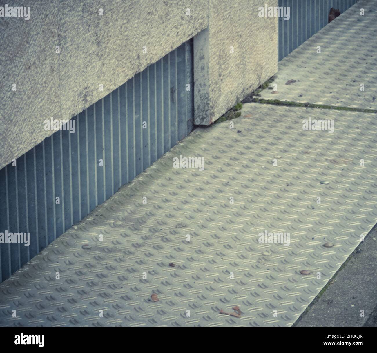 A view of a metal floor plate on the sidewalk Stock Photo - Alamy