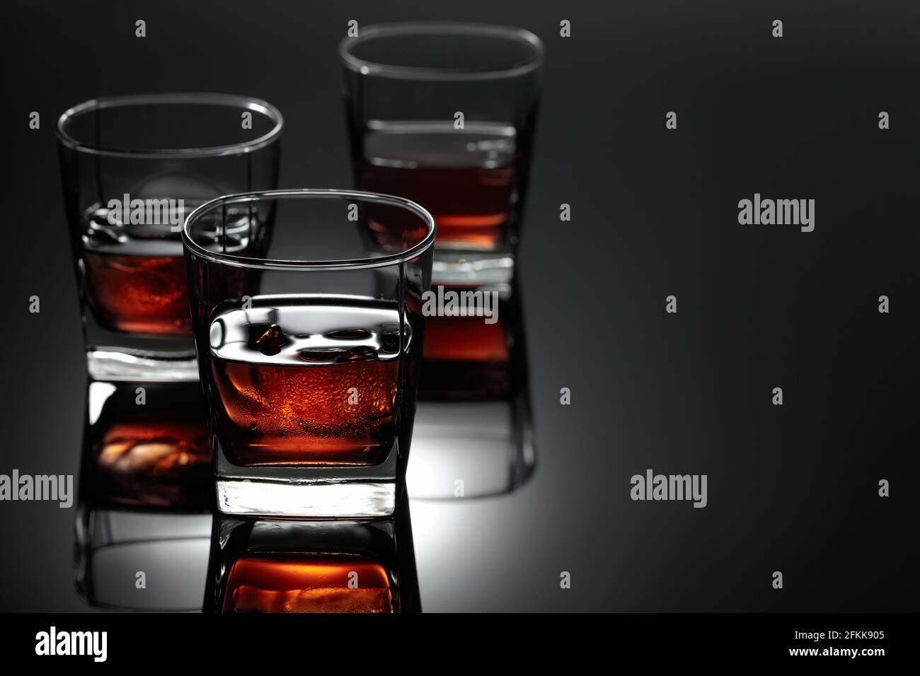 Whiskey On The Rocks. A strong alcoholic drink with Natural Ice in a ...
