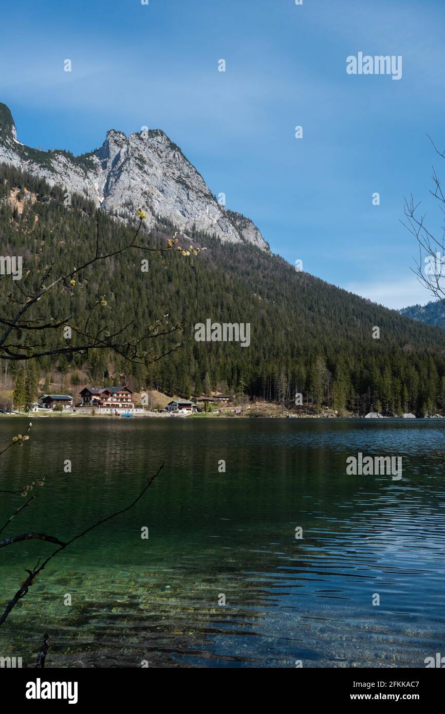 summer day at a green alpine lake in the bavarian mountains located in the national park berchtesgarden Stock Photo