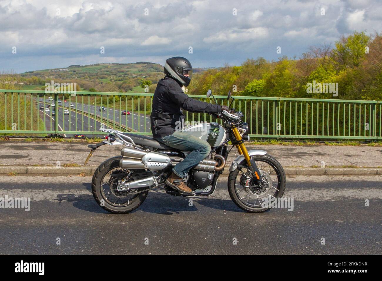 2019 Triumph Scrambler 1200 XE Motorbike rider; two wheeled transport, motorcycles, vehicle, roads, motorbikes, motorcycle bike riders motoring in Chorley, UK Stock Photo