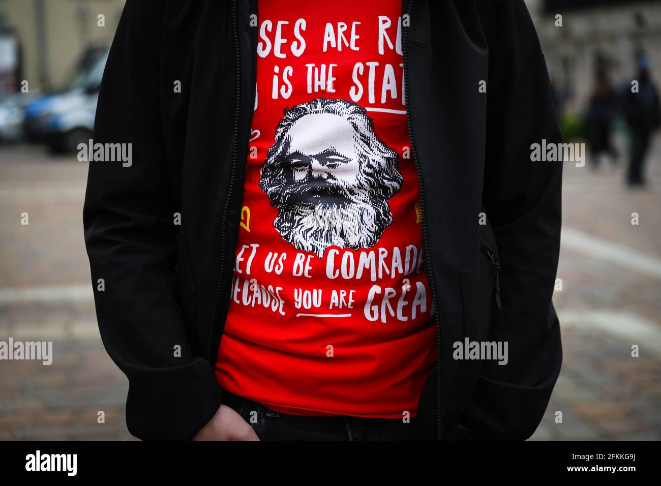 Cracow, Poland. 01st May, 2021. A picture of Karl Marx is seen on a  protester's t-shirt during the demonstration.International Workers' Day,  also known as Labour Day or May Day has a long