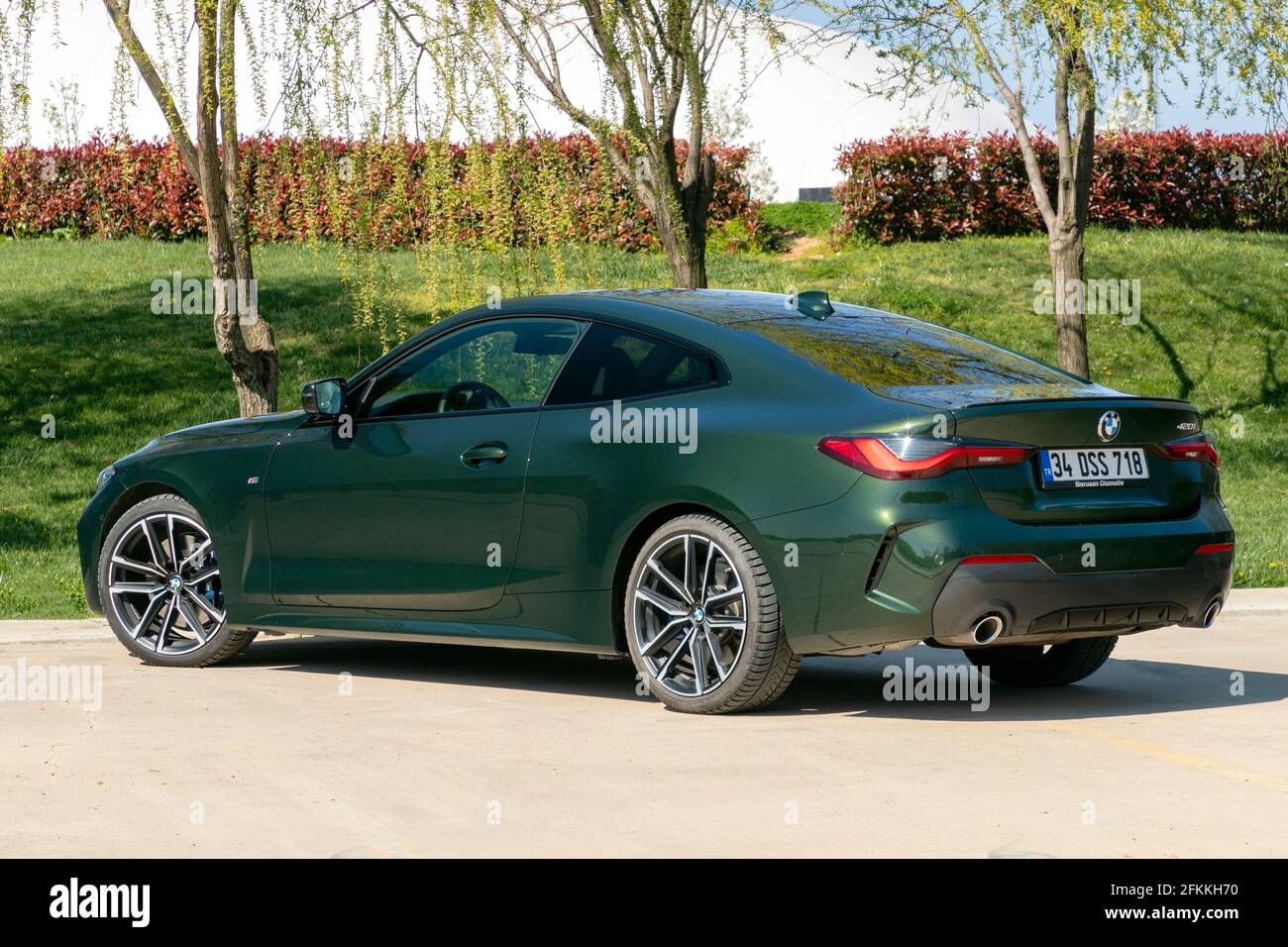 BMW 4 Series is a range of compact executive cars manufactured by BMW. A  green BMW 420i coupe car is parked on road Stock Photo - Alamy