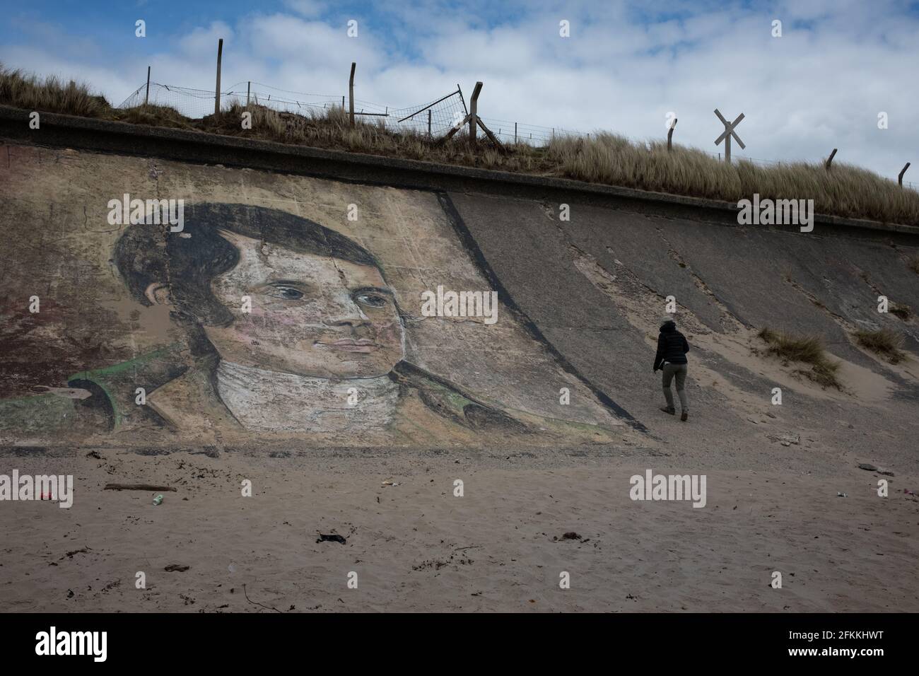 Portrait of Scottish poet Robert Burns, painted on a concrete wall on Ardeer beach, in Ardeer, Scotland, on 2 May 2021. Stock Photo