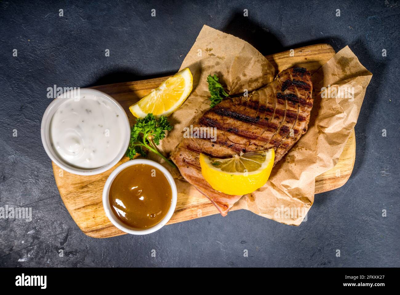 Grilled tuna steaks with spices and lemon, bbq keto diet fod concept