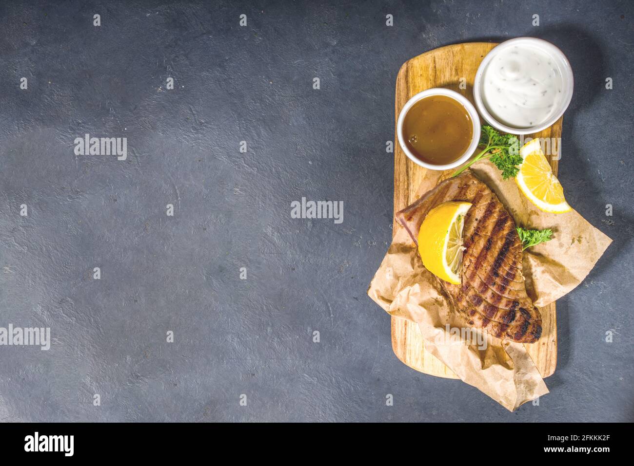 Grilled tuna steaks with spices and lemon, bbq keto diet fod concept