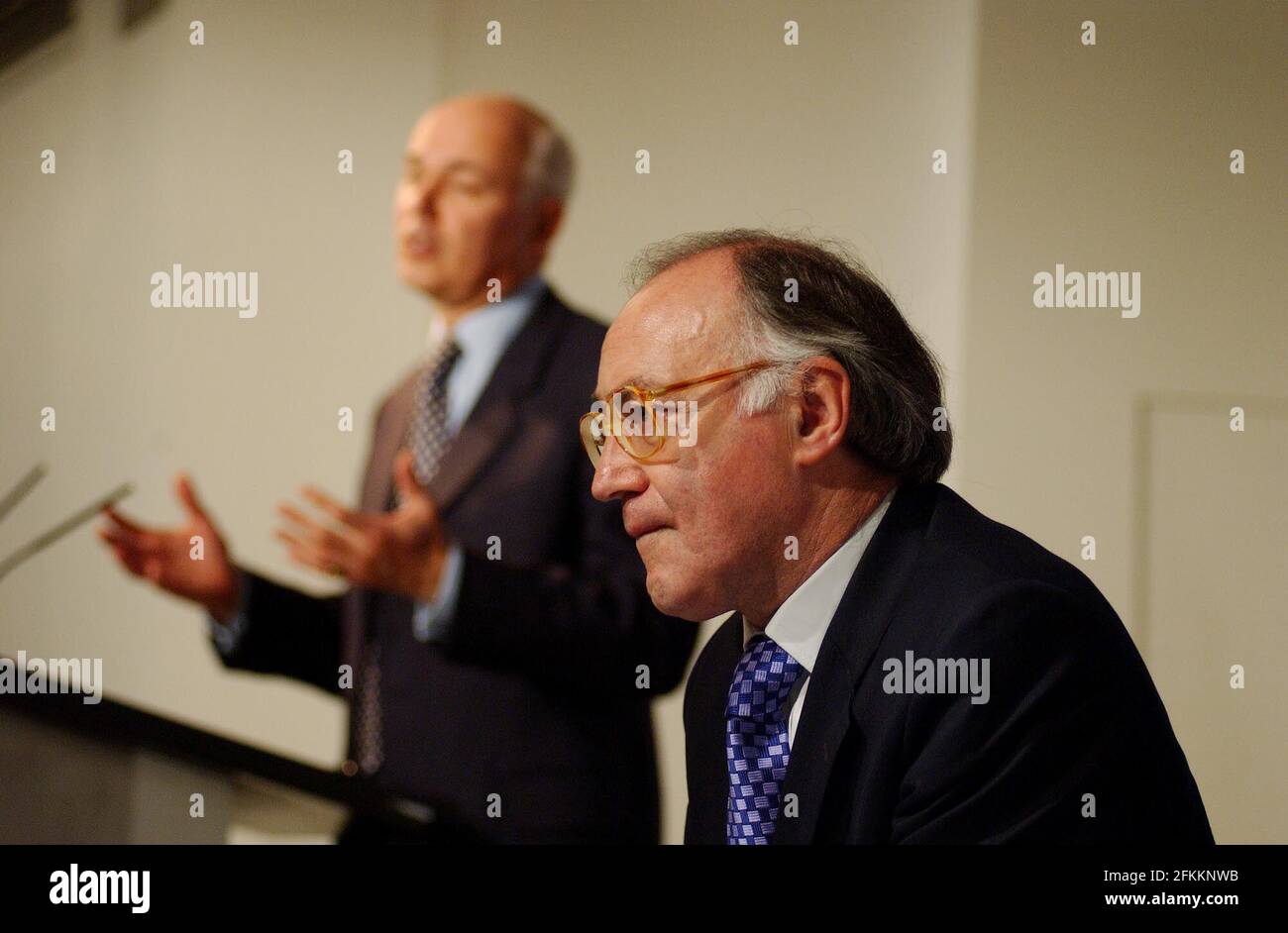 Conservative Leader Ian Duncan Smith giving a Press conference this morning in which he condemned Labours Brixton experiment. In the foreground is Consevative Shadow Chancellor Michael Howard.9 July 2002 photo Andy Paradise Stock Photo
