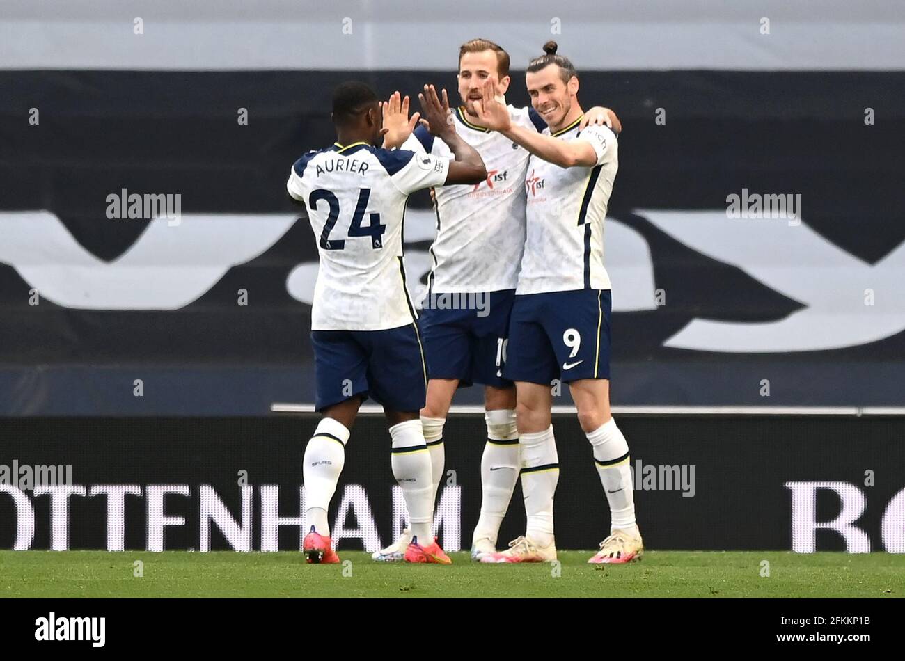 Tottenham Hotspur's Gareth Bale (right) celebrates scoring their side's  first goal of the game with team-mates Serge Aurier and Gareth Bale during  the Premier League match at the Tottenham Hotspur Stadium, London.