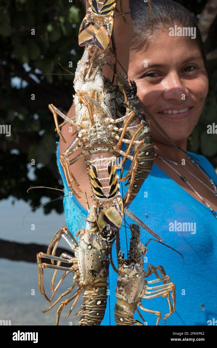Fisherwoman with lobsters Stock Photo
